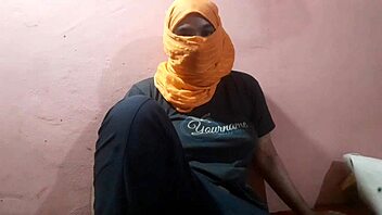 Woman reveals her large breasts in a seductive display