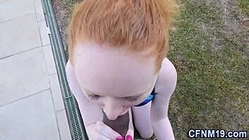 this redhead takes on a big cock in outdoor cfnm action, ending with a massive cumshot.