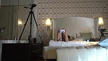 Big tits brunette babe teases in see-through dress revealing boobs under towel