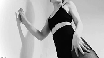 Fishnet tights tease ass and feet, but black and white contrast adds mystery