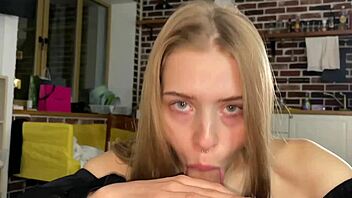 This cutie gives me a blowjob before slipping on the condom. She sucks eagerly until it's time for protection.