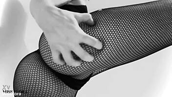 Fishnet tights tease ass and feet, but black and white contrast adds mystery