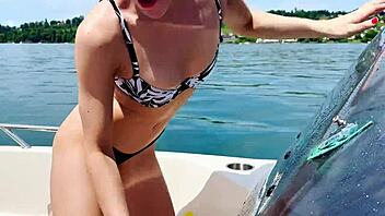 Boat wash turns fun with sexy blonde babe in thong swimsuit enjoying the beach vibes