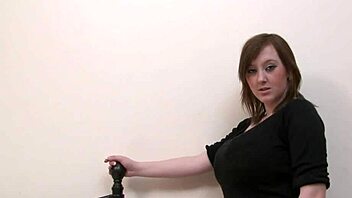 Curvy busty brunette teases big ass in stockings striptease