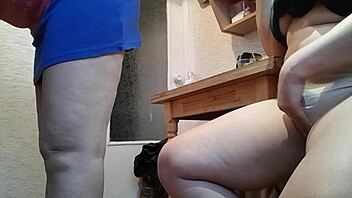 In a daring homemade moment, I masturbate riskily with cum and orgasm in the kitchen wearing miniskirt and wet panties next to open space.