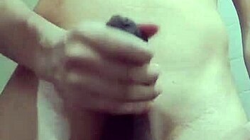 skinny guy masturbates solo with his big cock in workplace bathroom