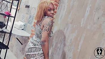 why is this ebony stripper twerking her big tits and ass in a sexy dress at the club?