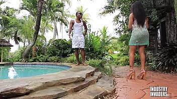 Damn, this curvy milf is taking on two huge black cocks at the resort for a wild double blowjob.