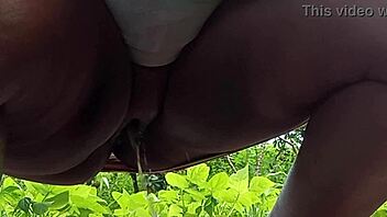 Feeling exposed as milf takes a public outdoor piss on the street