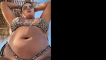 hey, check out this married hooker flaunting her huge ass in tiny bikini on the beach?