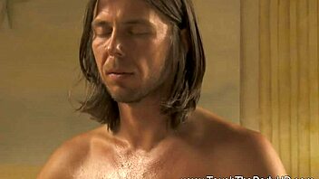 Sensual interracial couple explores advanced techniques in erotic pussy rubbing during massage.