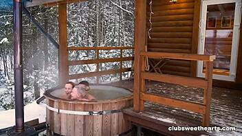 Winter snow special unfolds in the hot tub with young friends. They enjoy passionate moments together.