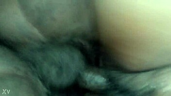 She bent over in doggystyle, squirting wildly during intense sex session.