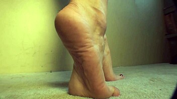 mckensie arches her feet in sexy solo posing session