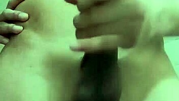 skinny guy masturbates solo with his big cock in workplace bathroom