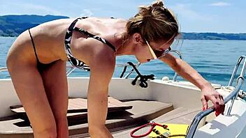 Boat wash turns fun with sexy blonde babe in thong swimsuit enjoying the beach vibes