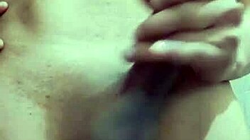 skinny guy masturbates solo with his big cock in workplace bathroom