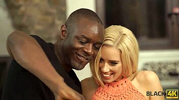 Why does a blonde notice her black BF's big cock during a selfie session, leading to interracial pussy licking?