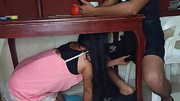 hidden lover sneaks under the table to give an intense amateur blowjob to this horny latina teen