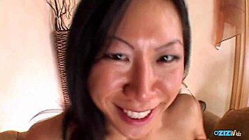 hey, this asian milf with fake tits loves masturbating while deepthroating that cock for anal fun 😈🍆