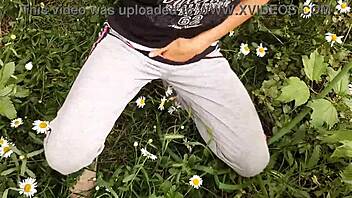 Hey, I caught my neighbor masturbating wildly in the daisies - such a hot orgasm spy moment! 👀🌼