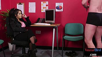 dom office babe in lingerie observes her colleague at work