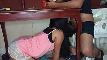 hidden lover sneaks under the table to give an intense amateur blowjob to this horny latina teen