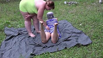 Lesbians with big asses enjoy full fisting in hairy pussies outdoors for fetish orgasm