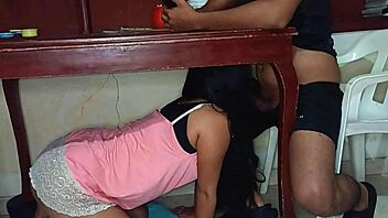 hidden lover sneaks under the table to give an intense amateur blowjob to this horny latina teen