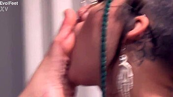 Pretty barefoot girl gets tickled and gagged with deepthroat vibrator while toes are sucked to cum.