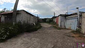 Horny brunette student delivers sloppy blowjob and swallows cum behind the garages in public