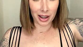 paige wears fishnets and handles large toy