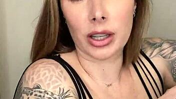 paige wears fishnets and handles large toy