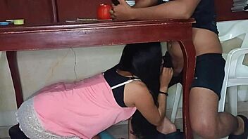 hidden lover sneaks under the table to give an intense amateur blowjob to this horny latina teen
