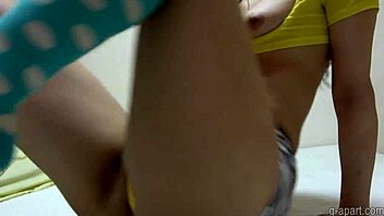 japanese girl in bikini spreads legs wide on webcam showing cameltoe and asian beauty