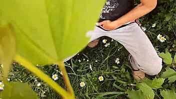 Hey, I caught my neighbor masturbating wildly in the daisies - such a hot orgasm spy moment! 👀🌼