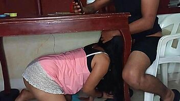 hidden lover sneaks under the table to give an intense amateur blowjob to this horny latina teen