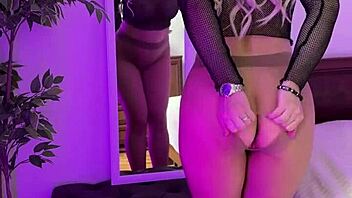 hot milf tearing her tights in sexy lingerie and heels