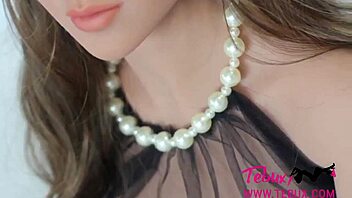 hey check out this real life sex doll a brunette beauty with big tits