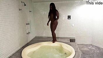 nebra with african descent and athletic brazilian body shines her black skin climbing stairs completely nude to tease