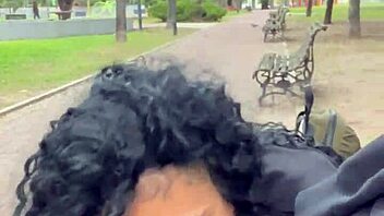 Swallowing cum in a public park during daytime in Buenos Aires