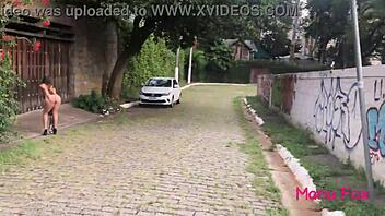 hey, check out this brazilian brunette flashing her big ass and tits naked in the street!