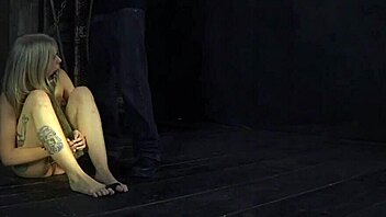 bdsm session features electro castigation with hardcore elements like spanking and tight bondage