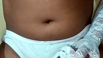 Ladyboy shemale wearing erotic white panty and bra.