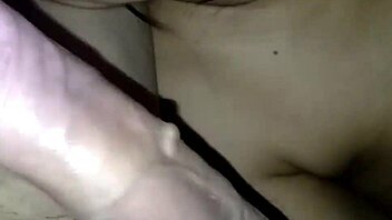 She teases with her wet shaved pussy before riding to a creamy orgasm.