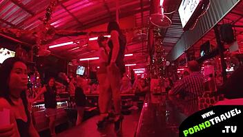 asian bar girl shows off her dancing moves