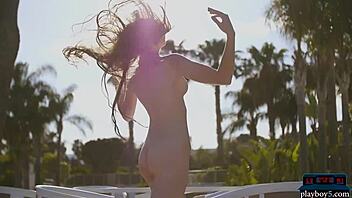 Hey, check out petite Russian centerfold Kate Chromia stripping outdoors in her bikini.