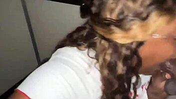 Ebony BBW throats strangers' BBC at the glory hole