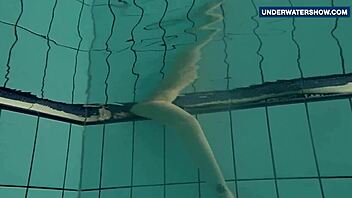 Flashing bright tits underwater in bikini makes everyone feel the thrill