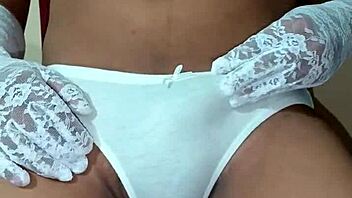 Ladyboy shemale wearing erotic white panty and bra.